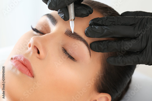 Young woman undergoing proc...