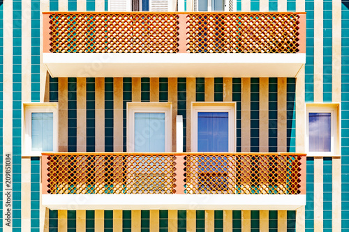 Colorful striped house facades in Portugal