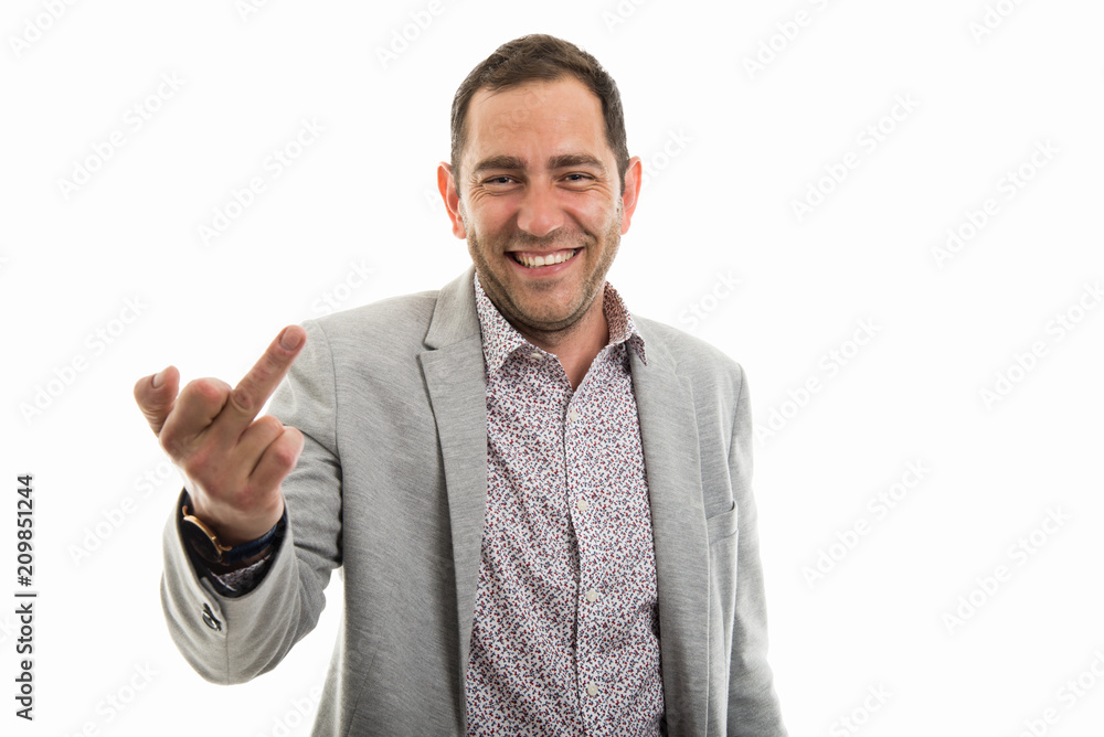 Portrait of business man showing middle finger sign Portrait of business man showing middle finger sign