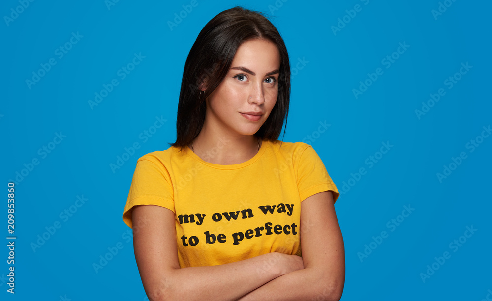 Confident young woman smiling Confident young woman smiling