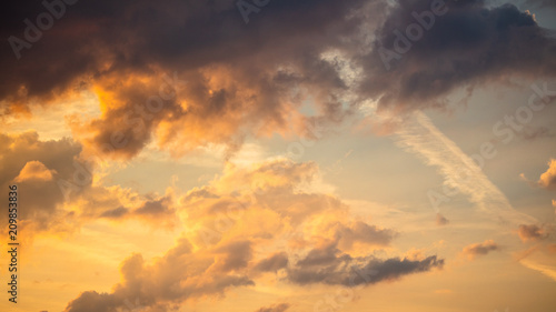 Clouds in the sky at sunset as background © schankz