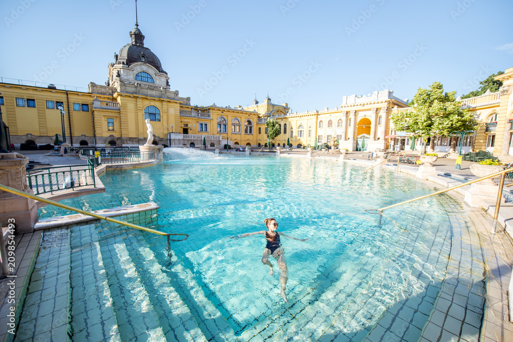Fototapeta premium Woman relaxing at the famous Szechenyi thermal bathes in Budapest, Hungary