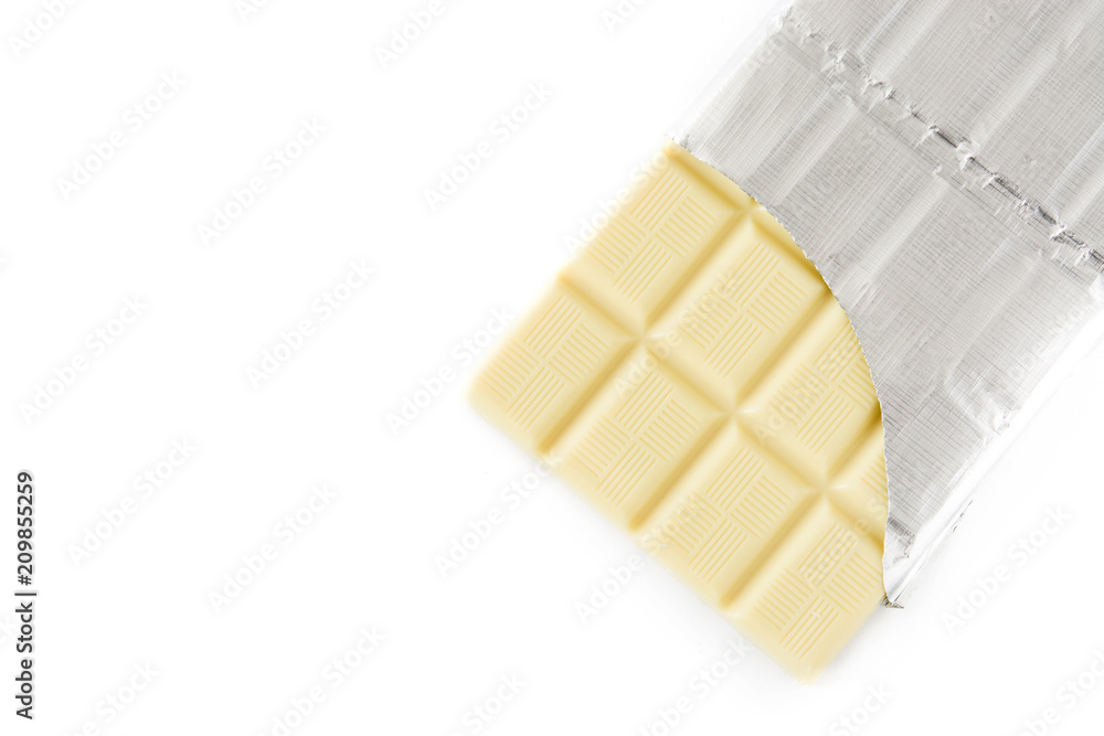 White chocolate bar wrapper isolated on white background. Top view. Copyspace White chocolate bar wrapper isolated on white background. Top view. Copyspace