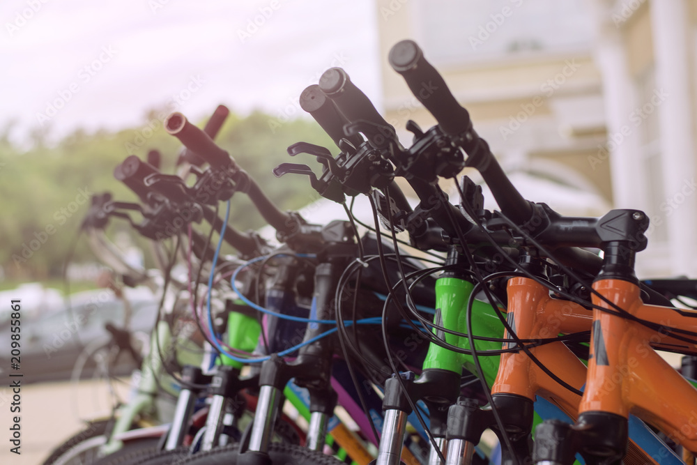 Fototapeta premium Parked bikes on a parking lot.