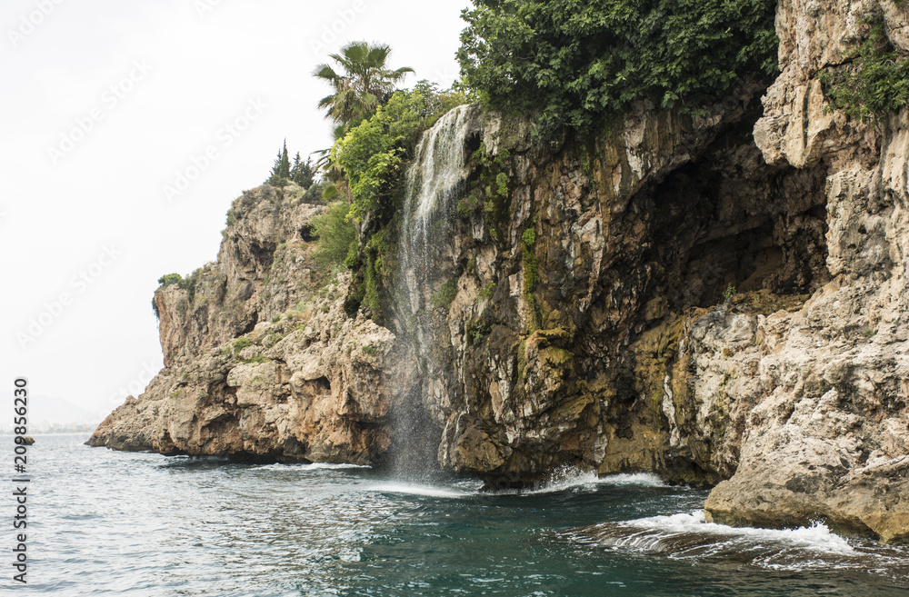 Waterfall over the sea in Antalya , Turkey