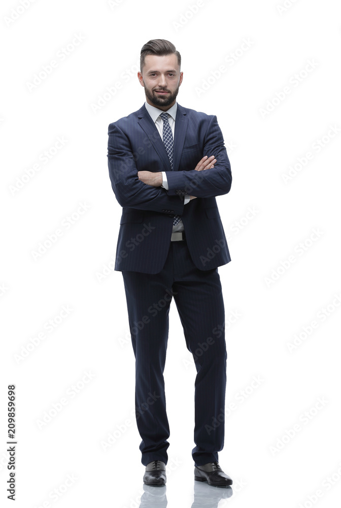 in full growth. businessman arms folded in full growth. businessman arms folded