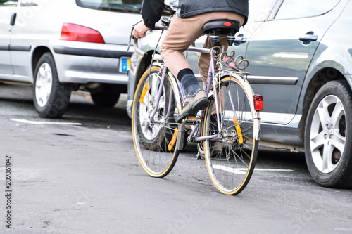 man ridig bicycle in the city