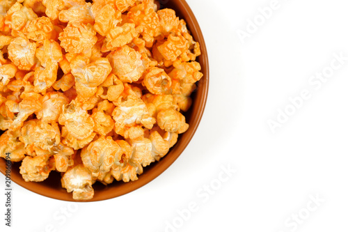 View from above popcorn in the bowl isolated on the white background
