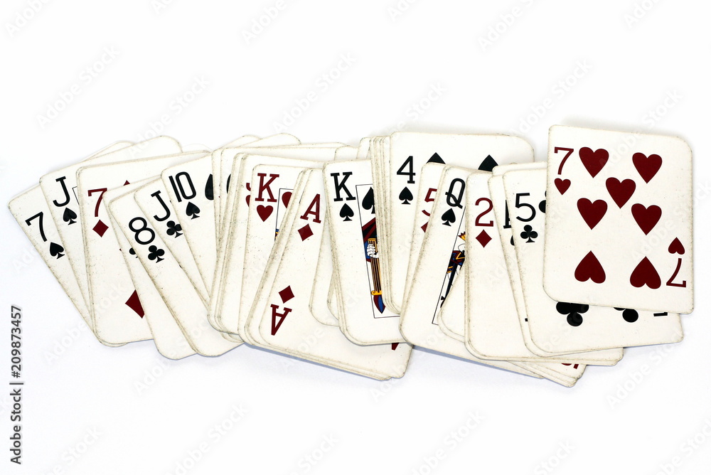 A deck of old-fashioned playing cards spread out, on a white background  Stock Photo | Adobe Stock