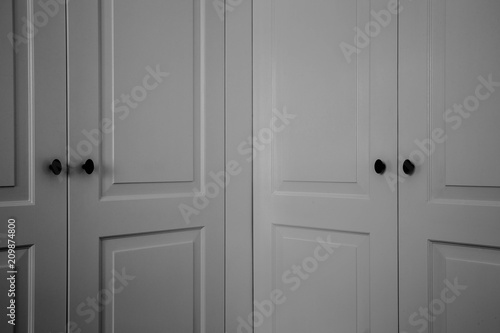 double closet doors dark black and white modern interior close-up