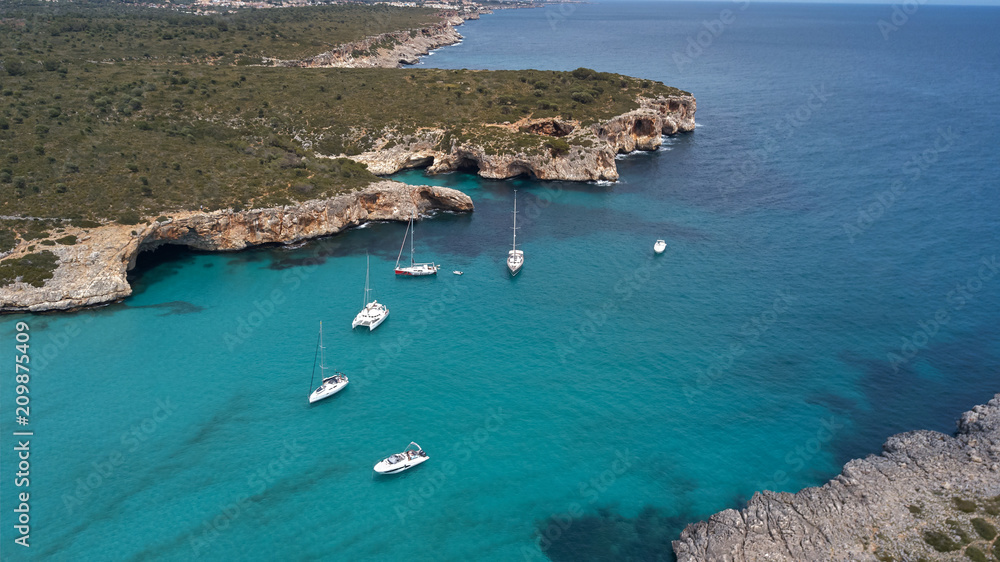 luxury yacht on the coast of Majorca, overlooking cliffs