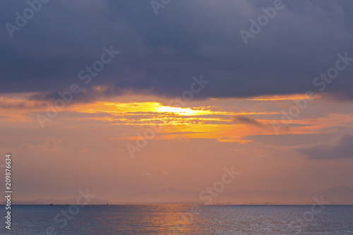  Morning light before the rain falls at sea © Teerayuth