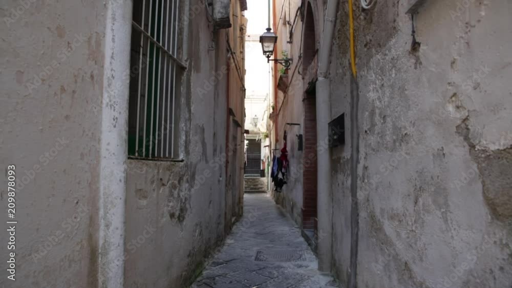 Narrow street with washing, Amalfi, Italy Narrow street with washing, Amalfi, Italy