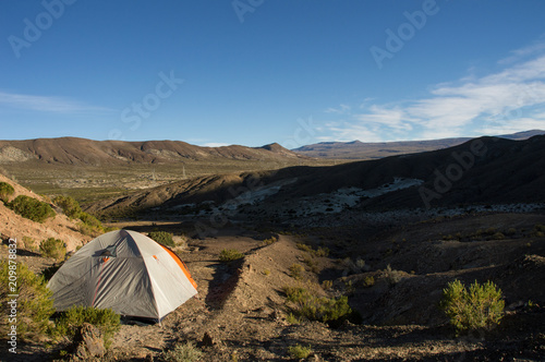 in Bolivian highland with tent