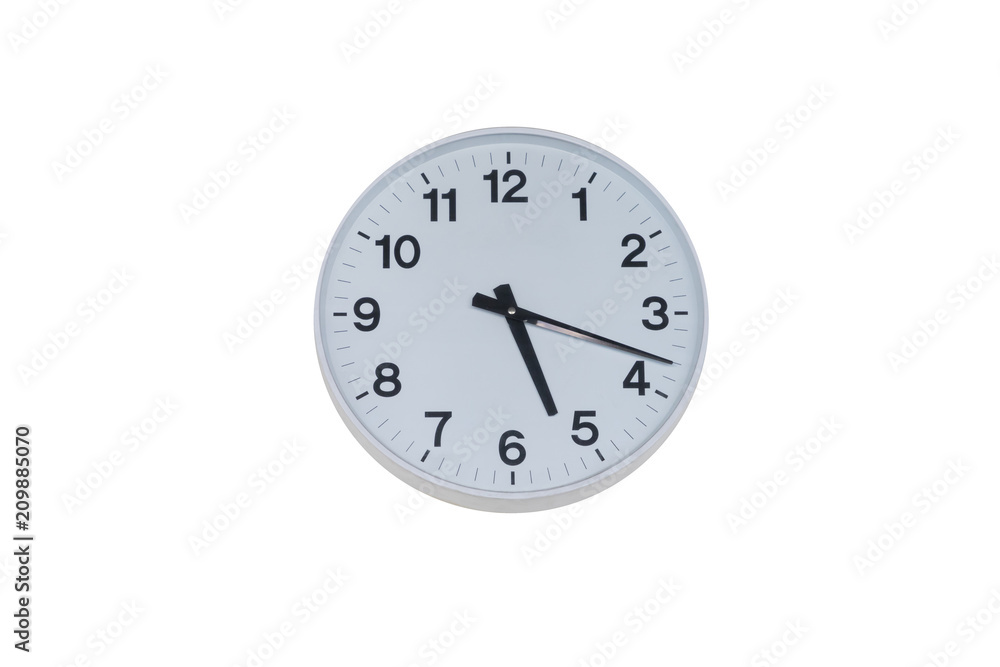 white metal clock wall isolate on white background in evening time or early morning white metal clock wall isolate on white background in evening time or early morning