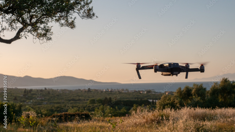 drone hovering during sunset drone hovering during sunset
