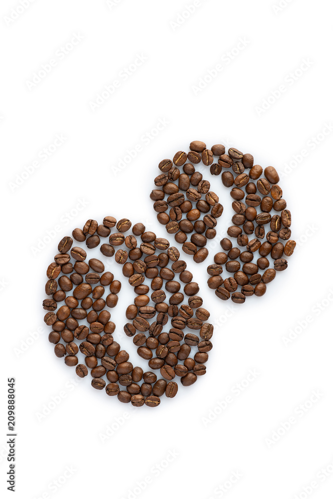 Silhouette of seeds made from roasted coffee beans. isolated on white background Silhouette of seeds made from roasted coffee beans. isolated on white background