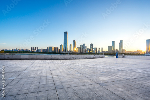 city skyline with modern office building © THINK b