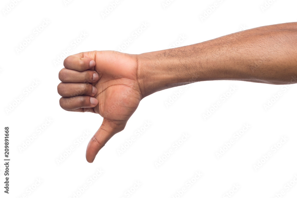 Thumb down of black man hand isolated on white background Thumb down of black man hand isolated on white background
