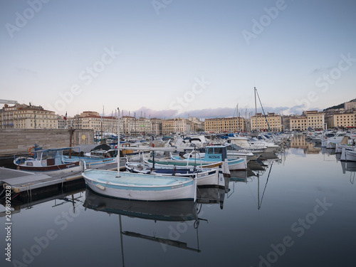 marseille  france  4 june 2018  many fishing boats and yaughts in old harbor of french city marseille at dusk