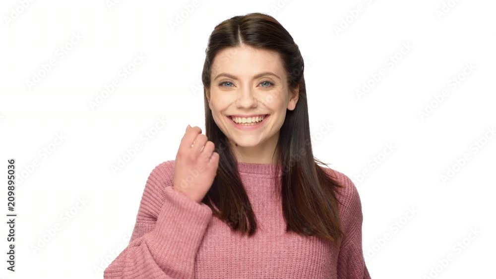 Horizontal portrait of seductive mature woman with elegant hairstyle giving air kiss to beloved person, over white background. Concept of emotions Horizontal portrait of seductive mature woman with elegant hairstyle giving air kiss to beloved person, over white background. Concept of emotions