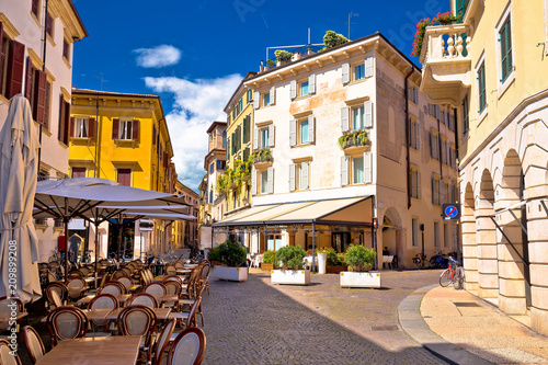 Fototapeta Naklejka Na Ścianę i Meble -  Italian street and cafe in Verona view
