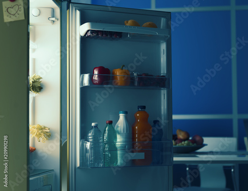 Open fridge in the kitchen