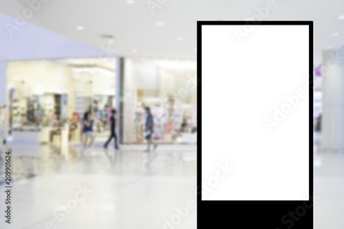 Blank billboard with copy space for your text message or content in shopping mall and luxury clothing derpartment store for background