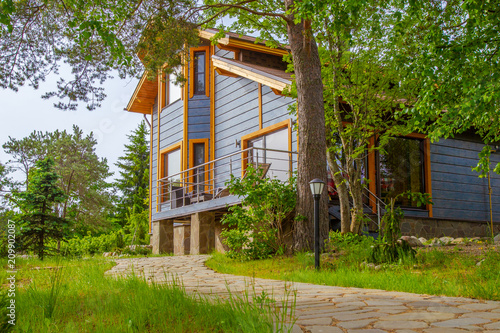Cottage. House with a path ...