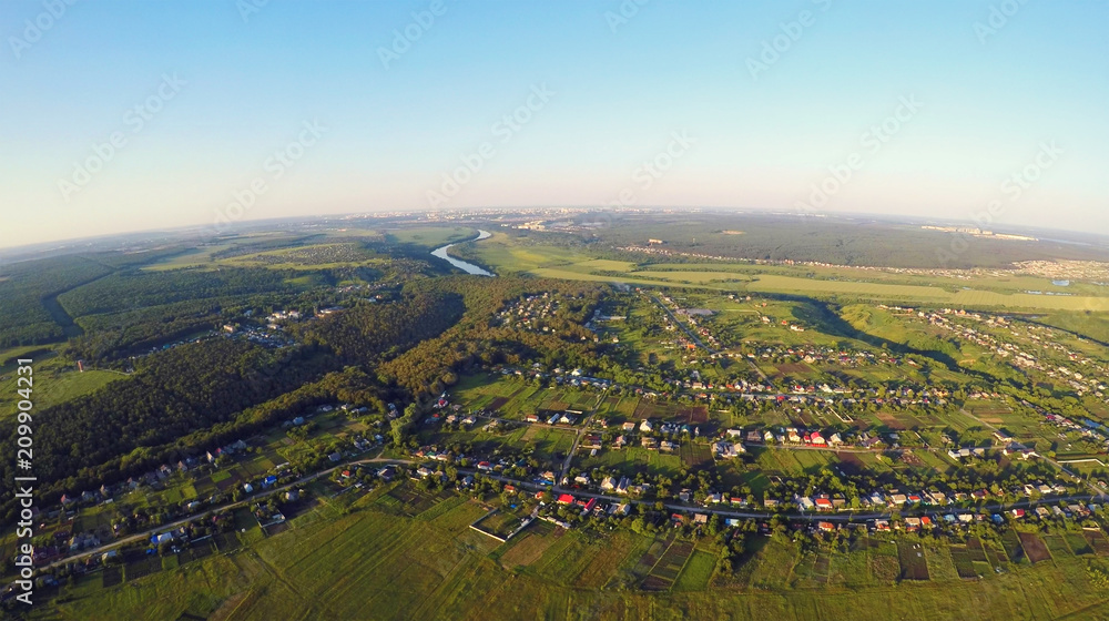 Aerial view of green fields and meadows in countryside, nature landscape panorama