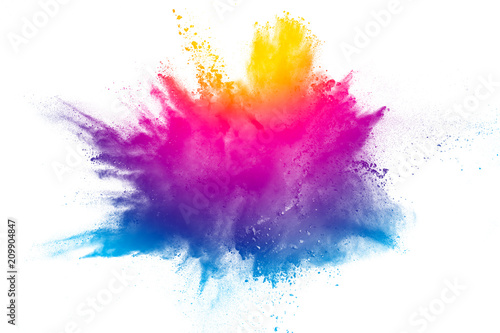 Explosion of rainbow color powder on white background.