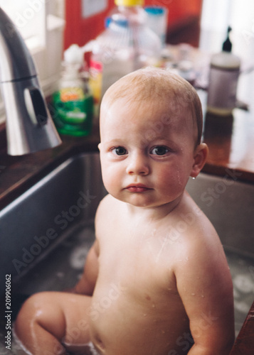 Calvin Taking a Bath in the Sink photo