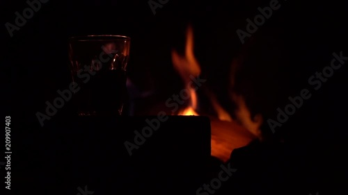 glass on the background of fire