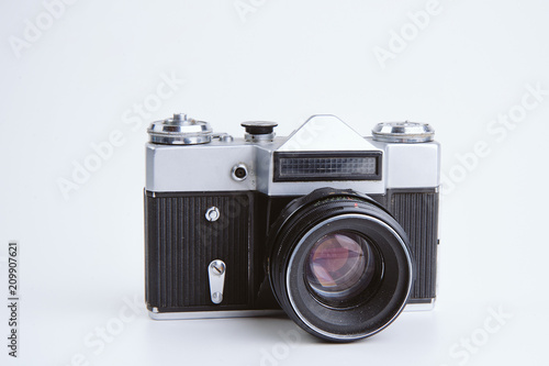 Old vintage camera on white background