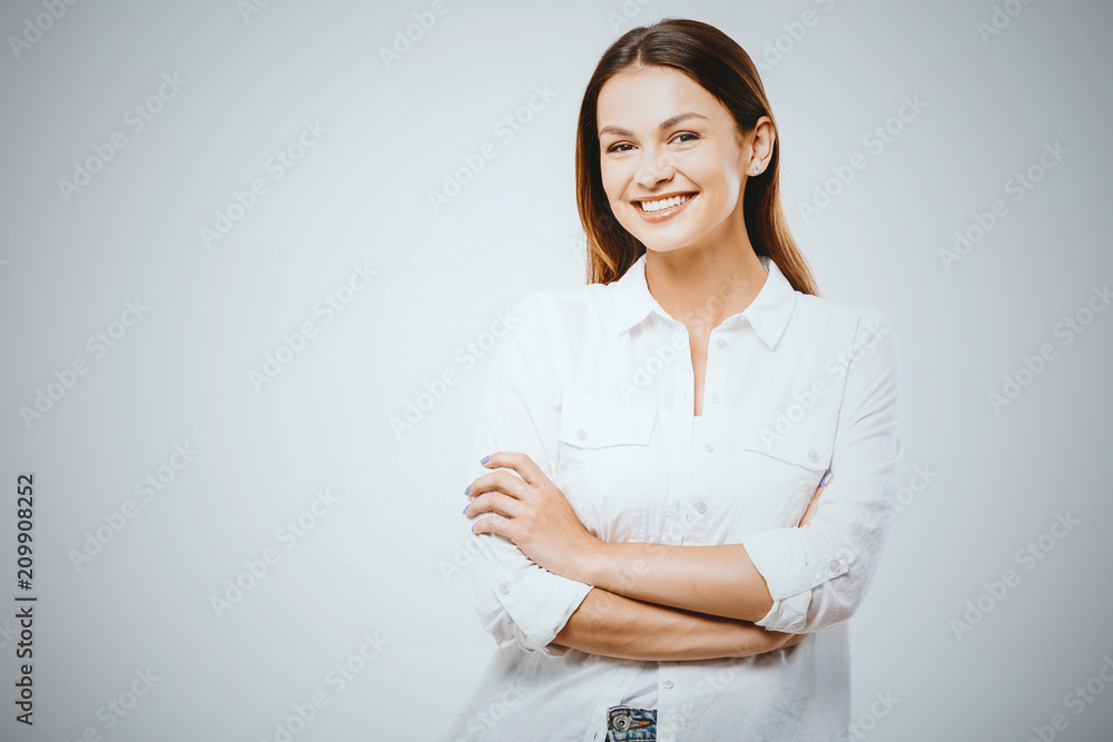 Portrait of happy smiling young beautiful woman, isolated over white background. Looking up. Free space for text. Portrait of happy smiling young beautiful woman, isolated over white background. Looking up. Free space for text.