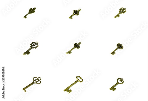 collection of a brass antique keys isolated on white background