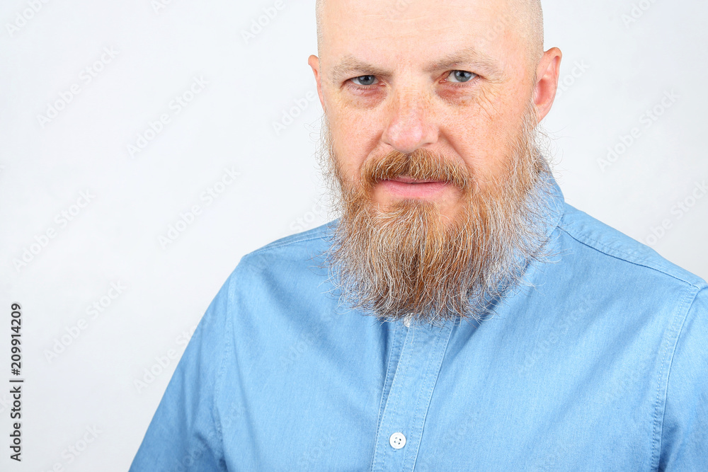 Fototapeta premium bearded man in blue denim shirt
