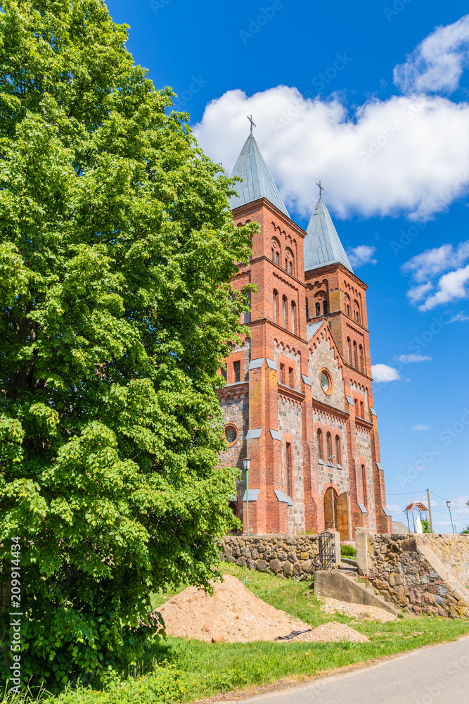 Fototapeta premium Majestic Church of God's Body from stone and brick in Ikazn, Belarus