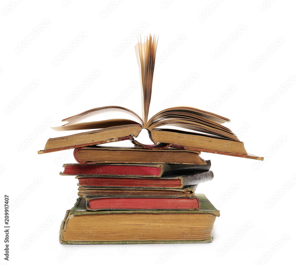 Stack of old antique big books isolated on white background Stack of old antique big books isolated on white background