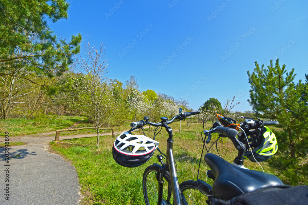 Obraz premium Two bicycles standing with accessories in the countryside of Berlin, Germany