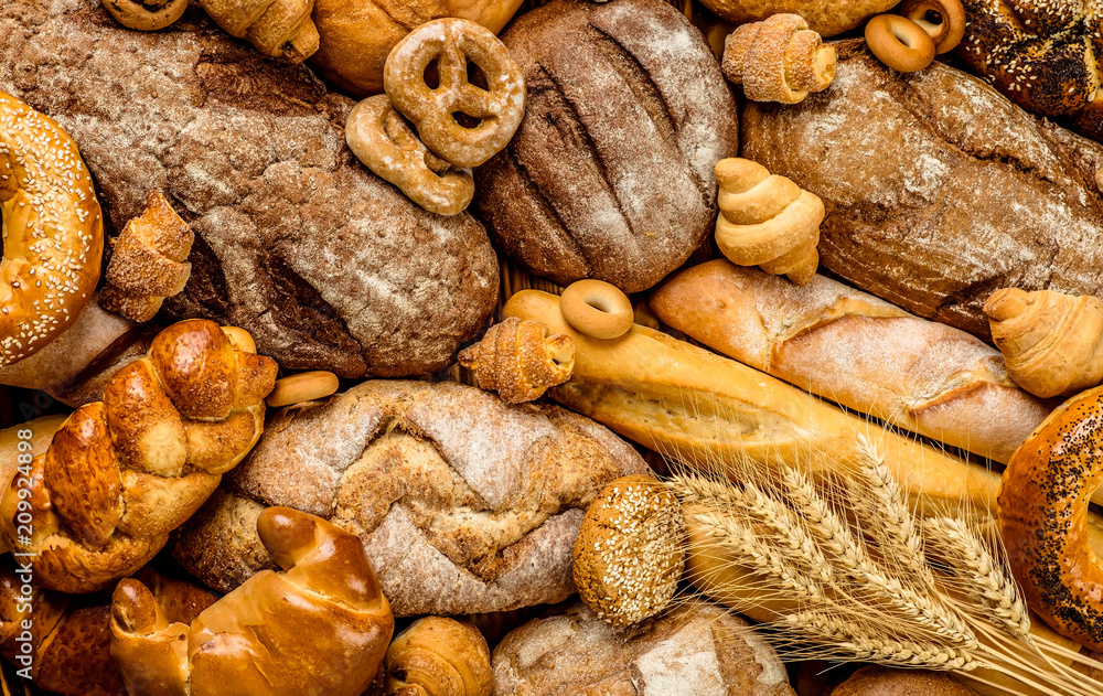 Fototapeta premium Fresh fragrant bread on the table. Food concept