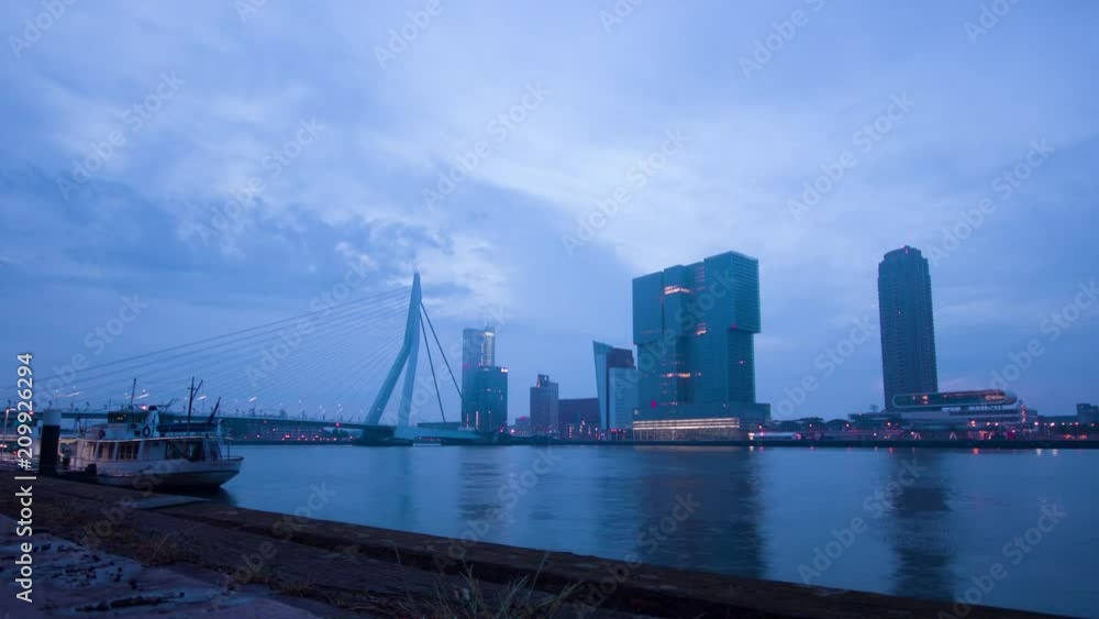 Morning timelapse of the Rotterdam skyline with the Erasmusbrug. Morning timelapse of the Rotterdam skyline with the Erasmusbrug.