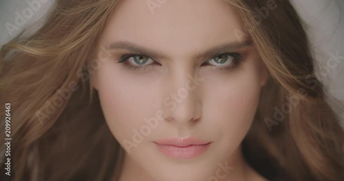 Wallpaper Mural Young attractive girl looking at camera posing for fashion magazine 4k Torontodigital.ca