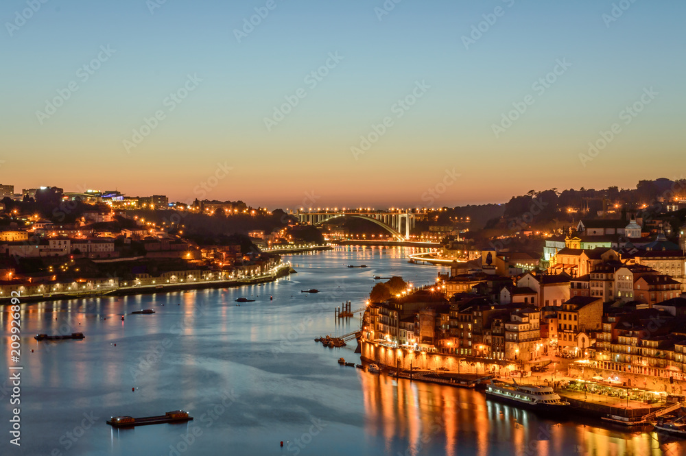 Sunset view of Porto and the river Douro in the middle, taken from Dom Luis I bridge