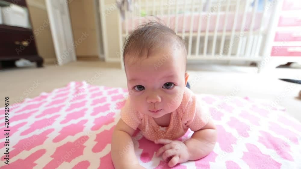 Baby Watching Camera Moving on Floor Baby Watching Camera Moving on Floor