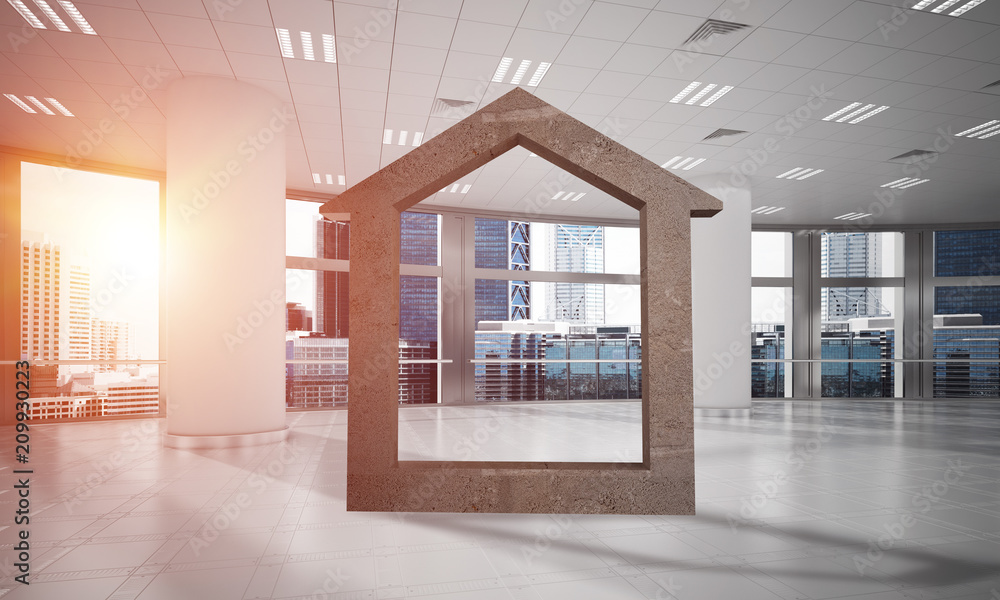 Fototapeta premium Conceptual background image of concrete home sign in modern office interior