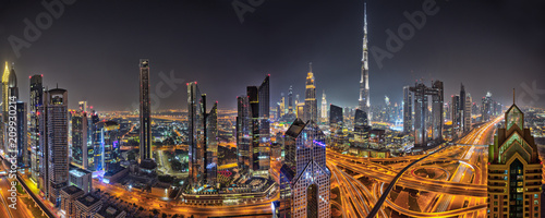 Leinwand Poster Panorama of Dubai skyline during sunset, United Arab Emirates.