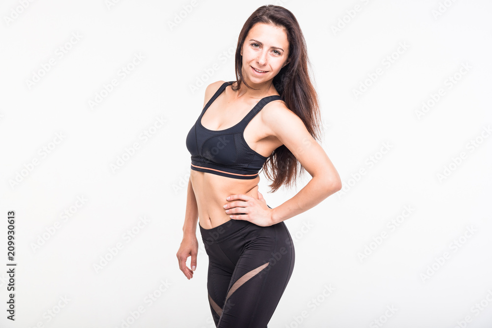 Athlete engaged in fitness on a white background Athlete engaged in fitness on a white background