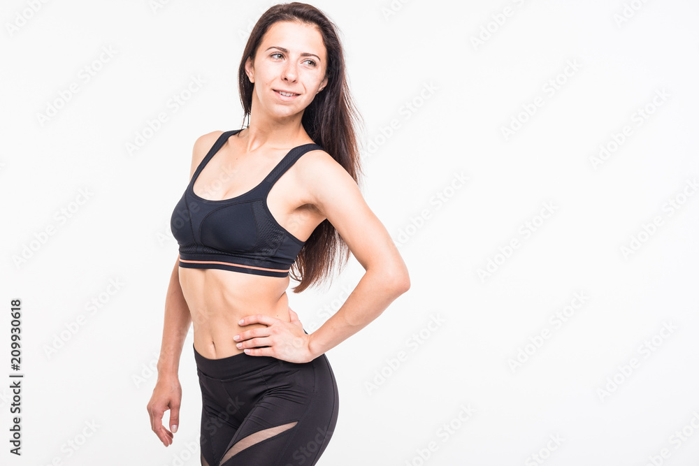 Athlete engaged in fitness on a white background Athlete engaged in fitness on a white background