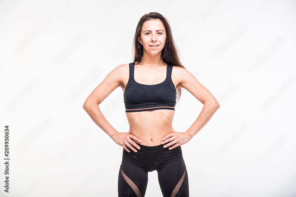 Athlete engaged in fitness on a white background Athlete engaged in fitness on a white background